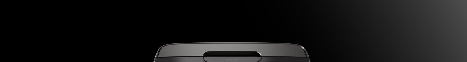 A black projector sits at the bottom of a dark gradient background.