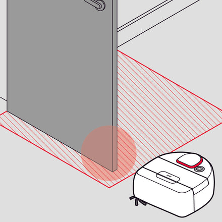 A robot vacuum detects a red no-go zone in front of a partially open door.