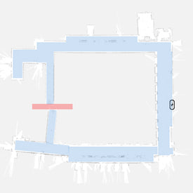 Simple floor plan with a red bar crossing a hallway on the left and an elevator symbol on the right side.